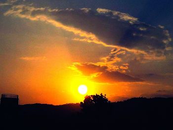 Scenic view of dramatic sky during sunset