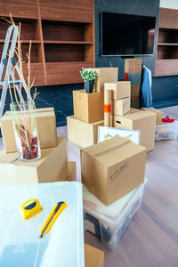 High angle view of boxes and furniture in new home