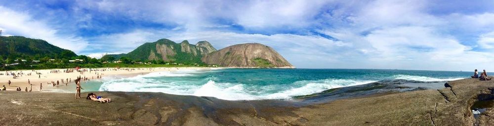 Panoramic view of people on beach