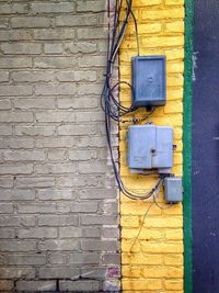 Fuse boxes on brick wall