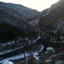 Scenic view of snow covered mountains