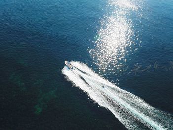 High angle view of ship sailing in sea