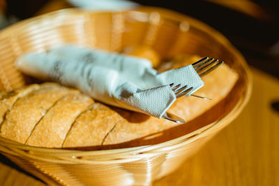 Cultery, silverware in a bread basket on a restaurant table in vienna, austria