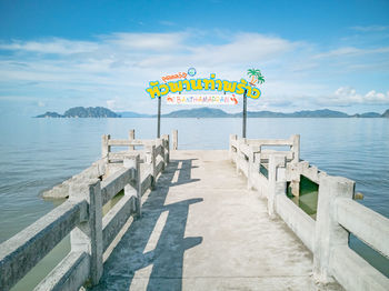 Scenic view of pier on sea against sky