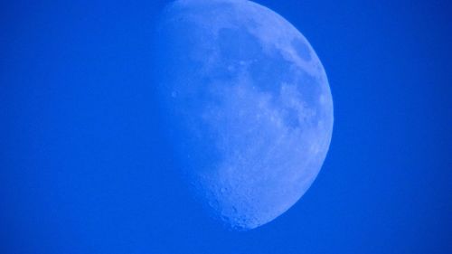 Low angle view of moon in sky