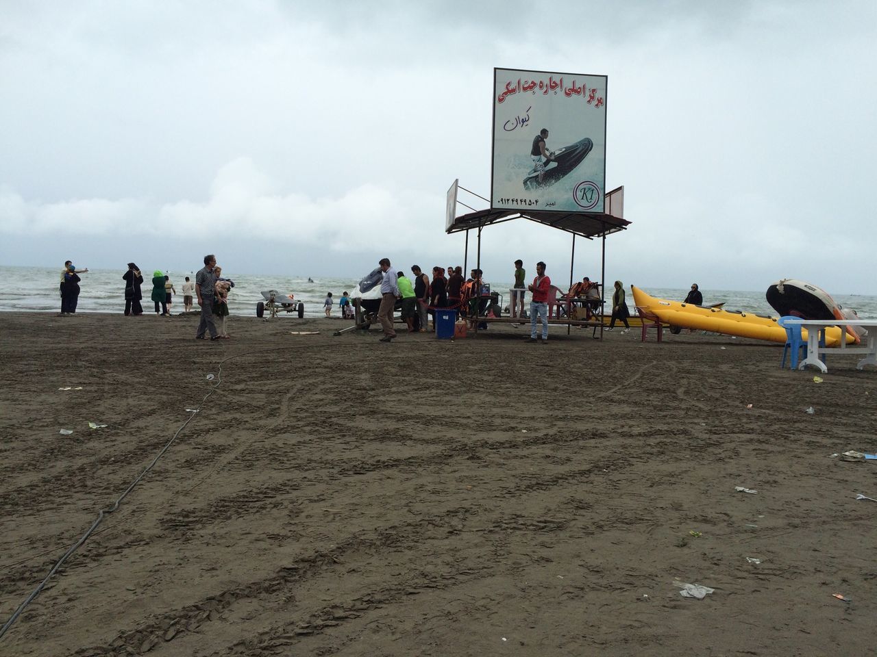 beach, sand, sky, cloud - sky, shore, sea, leisure activity, men, vacations, lifestyles, large group of people, cloud, person, tourist, cloudy, tranquility, nature, tranquil scene, day