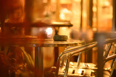 Close-up of illuminated lamp in room