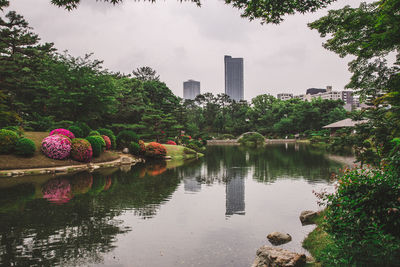 Japanese style beautiful park with a pond and hiroshima city