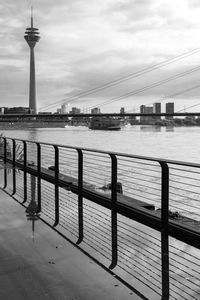 View of bridge over river with city in background