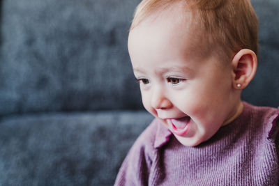 Cute baby girl at home