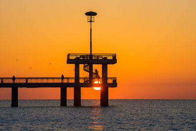 View of signboard at sunset