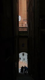Narrow alley along buildings