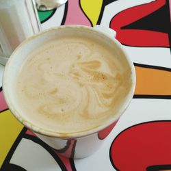 Close-up of coffee cup on table