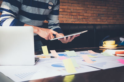 Man using laptop on table
