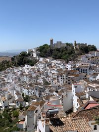 High angle view of mountain village in southern andalucia against sky