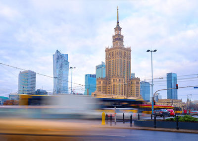 View of buildings against cloudy sky