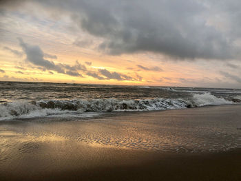 Scenic view of sea against sky during sunset