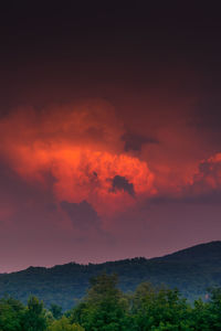 Scenic view of dramatic sky during sunset