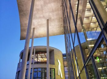 Low angle view of modern building against clear sky