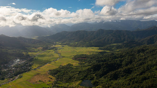  mountains with rainforest and agricultural land in a mountainous province in philippines.