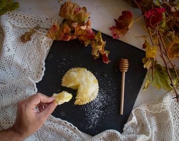 High angle view of person eating dessert