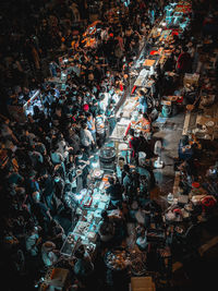 High angle view of people on street in city