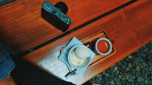 High angle view of coffee cup on table