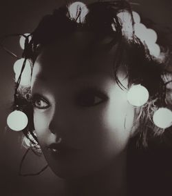 Close-up of illuminated light bulb