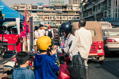 People on street in city