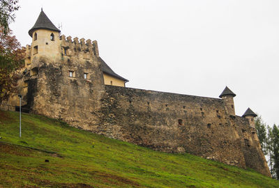 Low angle view of fort against clear sky