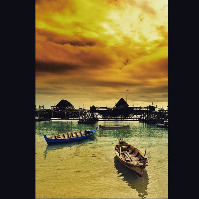 sunset, nautical vessel, water, boat, transportation, mode of transport, sky, moored, orange color, waterfront, cloud - sky, sea, beauty in nature, tranquility, scenics, auto post production filter, tranquil scene, cloud, nature, cloudy