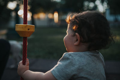 Close-up of baby girl at park