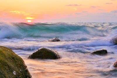 Scenic view of sea against sky during sunset