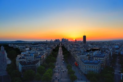 Aerial view of city during sunset