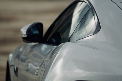 Close-up of luxury car on side-view mirror