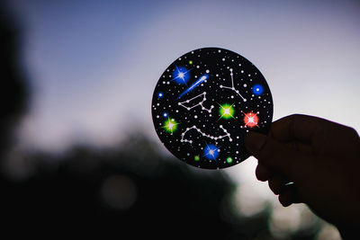 Close-up of hand holding bubbles
