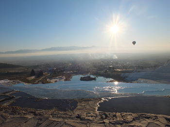 View of hot air balloon over sea