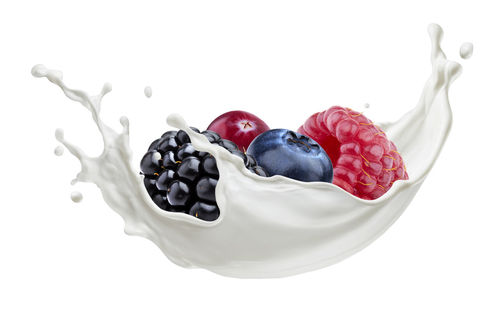 Close-up of strawberries in bowl against white background
