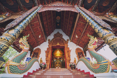 Low angle view of statue in temple building