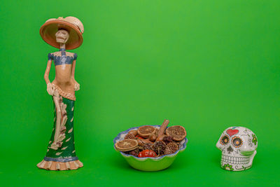 Close-up of food on table against green background