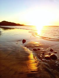 Scenic view of sea at sunset