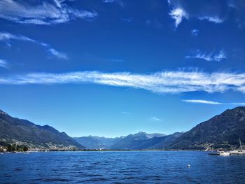 Scenic view of sea against blue sky