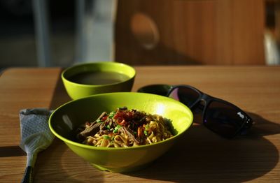 Close-up of fruits in bowl on table