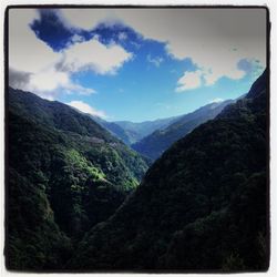 Scenic view of mountains against sky