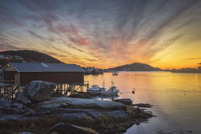 Surroundings of the typical norwegian village of reine at sunset