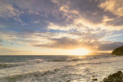 Scenic view of sea against sky during sunset