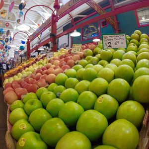 Multi colored fruits in container