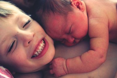 Close-up of mother holding baby