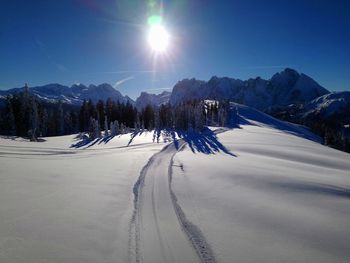 Snow covered mountain against sky