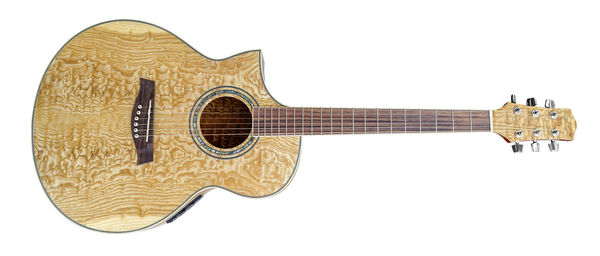 Close-up of guitar against white background